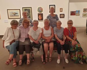 Photo of Members of MASH at the opening of their 21st Birthday exhibition- catching up the following morning