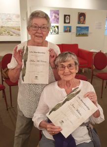 Photo of Members of MASH at the AGM receiving Life membership